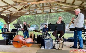 Musical group playing in an outdoor area